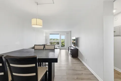 a view of a dining room with furniture