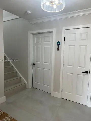 a view of an entryway with hallway