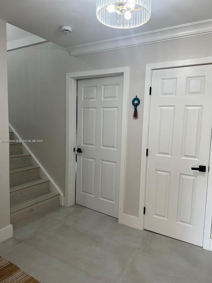 1103 South Collier Boulevard, Unit C108 Marco Island, FL 34145 - Photo 12 of 34 a view of an entryway with hallway
