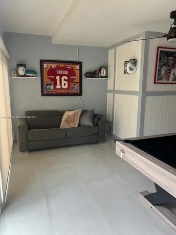 a living room with furniture and a couch