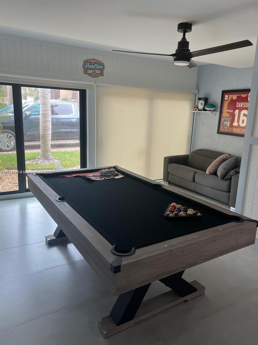 1103 South Collier Boulevard, Unit C108 Marco Island, FL 34145 - Photo 28 of 34 a bed sitting in a room next to a window