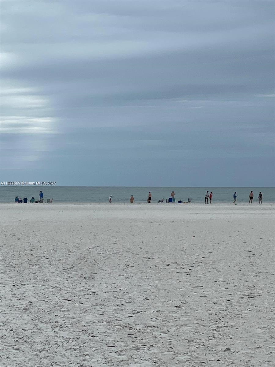 1103 South Collier Boulevard, Unit C108 Marco Island, FL 34145 - Photo 31 of 34 a view of an ocean beach