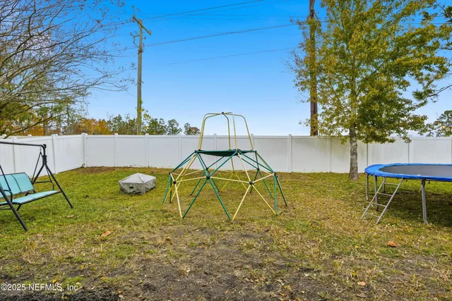 a view of a swimming pool with a lounge chairs