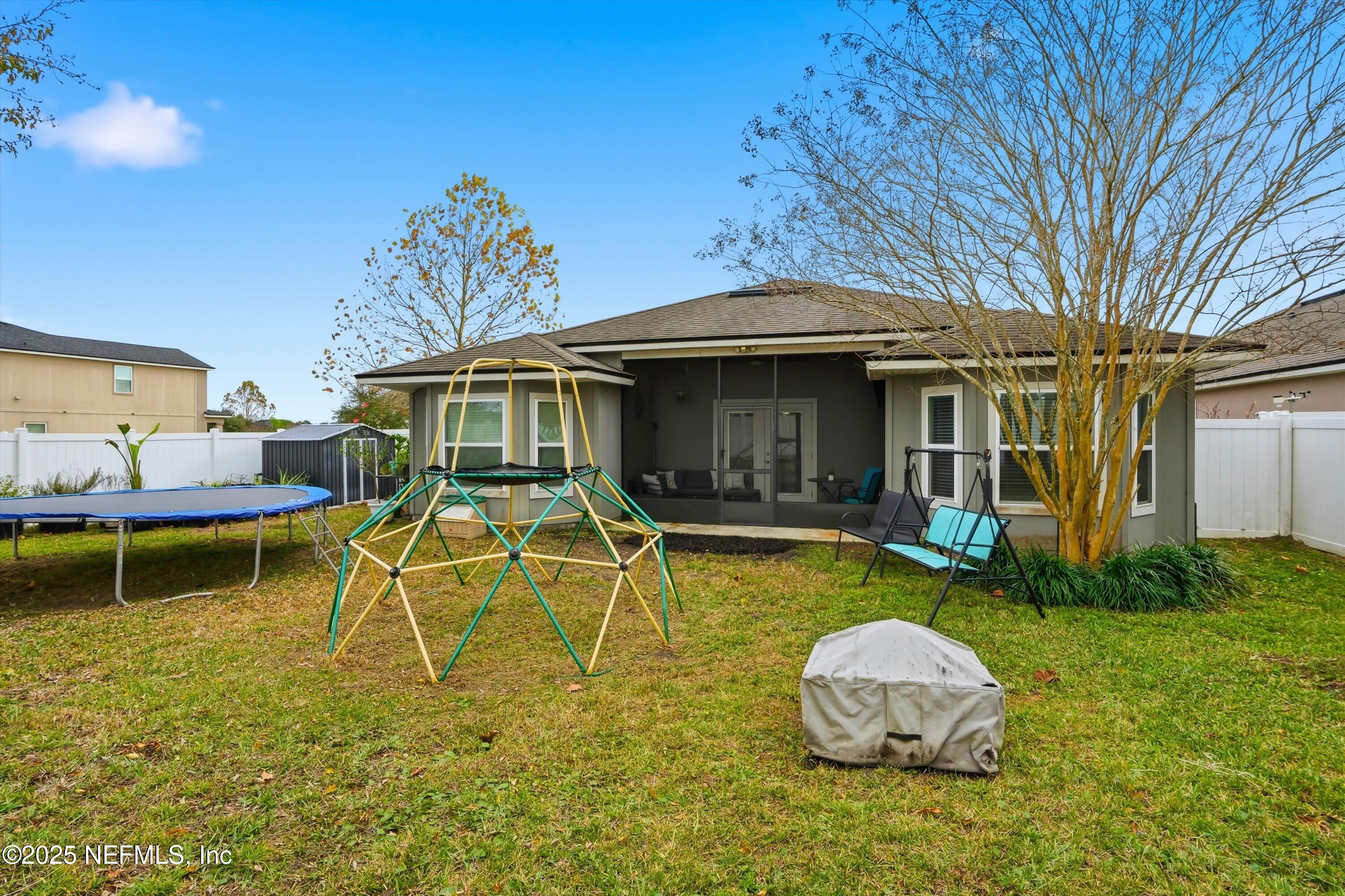 3994 Great Falls Loop Middleburg, FL 32068 - Photo 25 of 30 a front view of a house with swimming pool