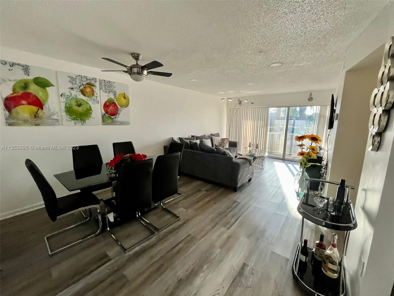 500 Davis Road, Unit 30 Palm Springs, FL 33461 - Photo 7 of 15 a view of a workspace with furniture and toys