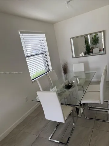 a bathroom with a shower and a toilet