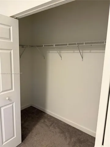 a small walk in closet
