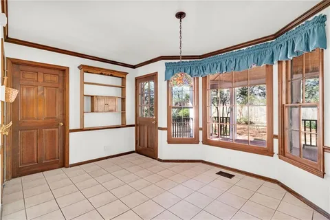 a view of a hallway with closet