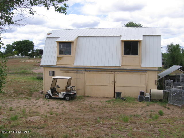 1120 North Moon Shadow Road Chino Valley, AZ 86323 - Photo 12 of 18 a view of a house with backyard