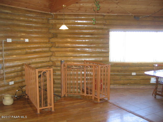 1120 North Moon Shadow Road Chino Valley, AZ 86323 - Photo 9 of 18 a view of a room with wooden floor