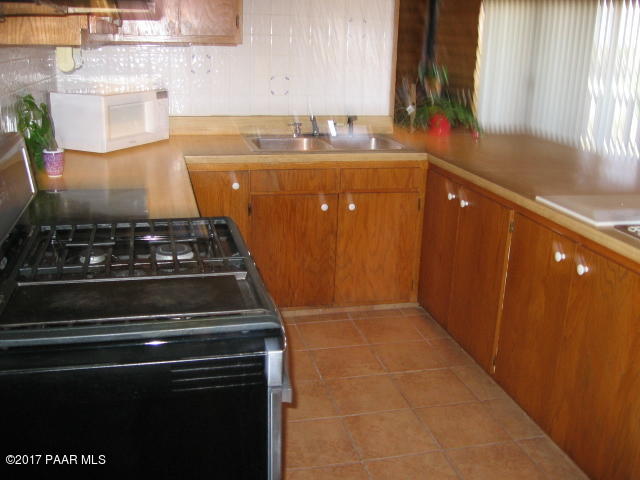 1120 North Moon Shadow Road Chino Valley, AZ 86323 - Photo 10 of 18 a close view of stove