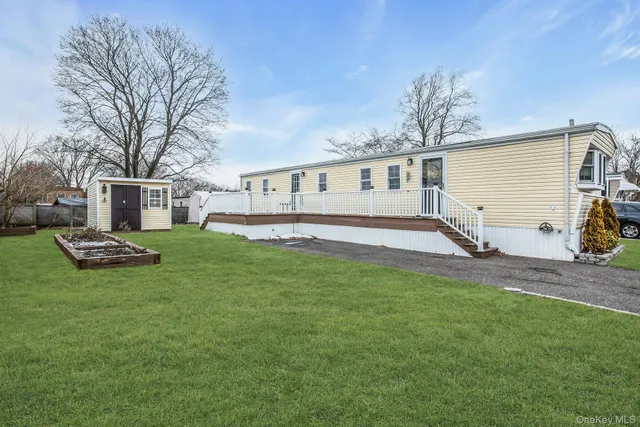 a house view with a garden space