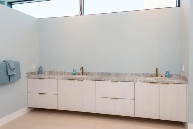a white bath tub sitting in a bathroom