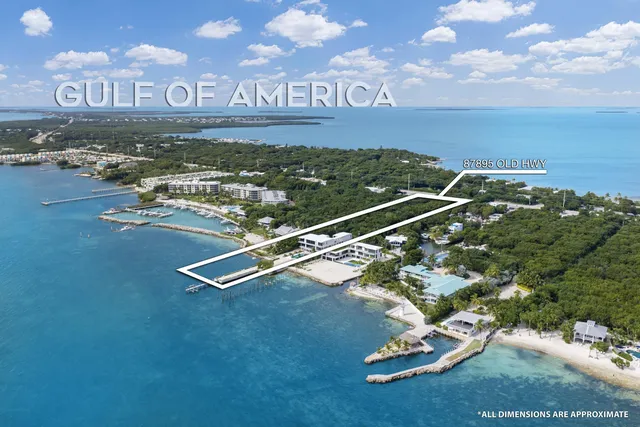 a view of a water with a floor to ceiling window