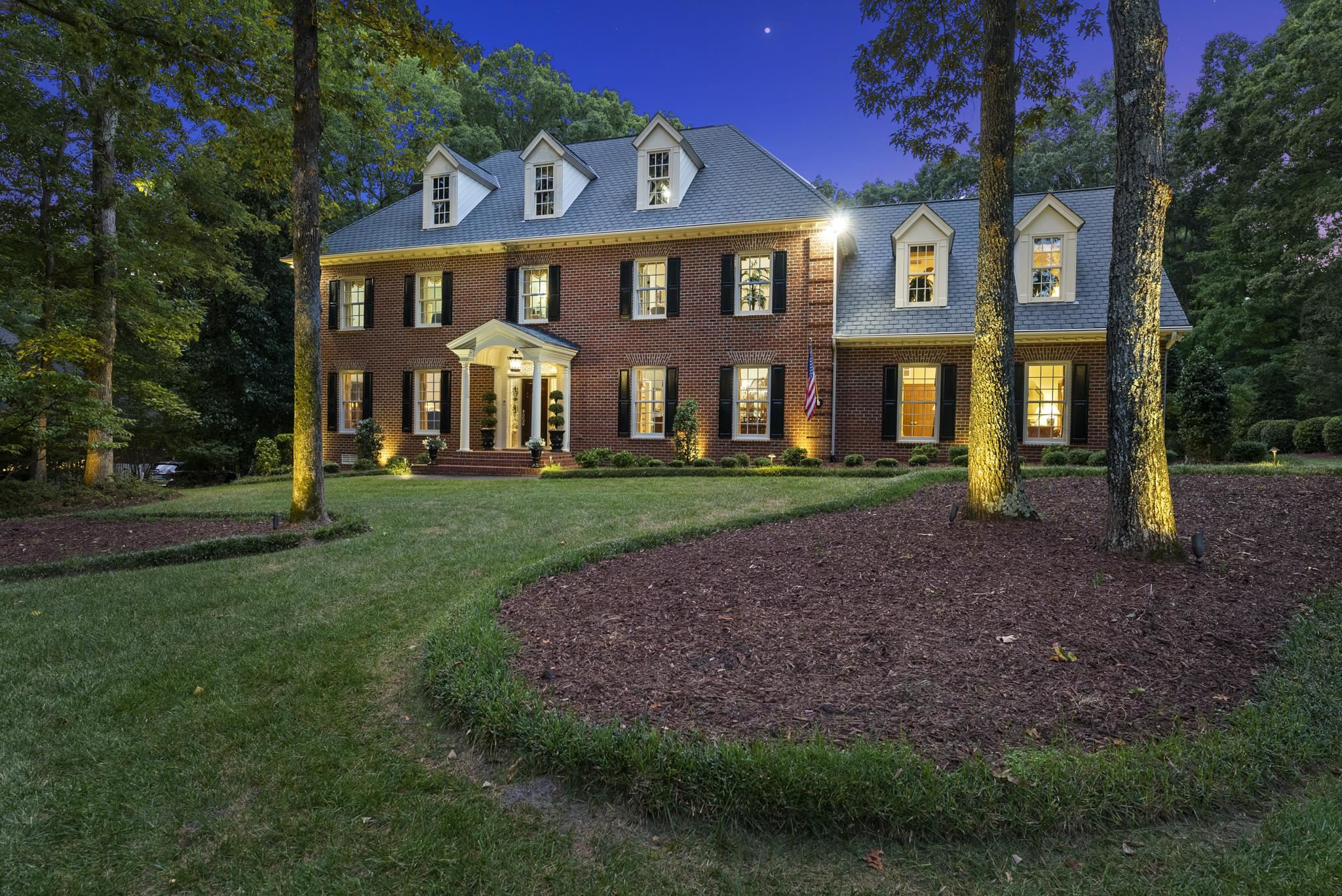 204 Carpathian Way Raleigh, NC 27615 - Photo 3 of 83 a front view of a house with a garden