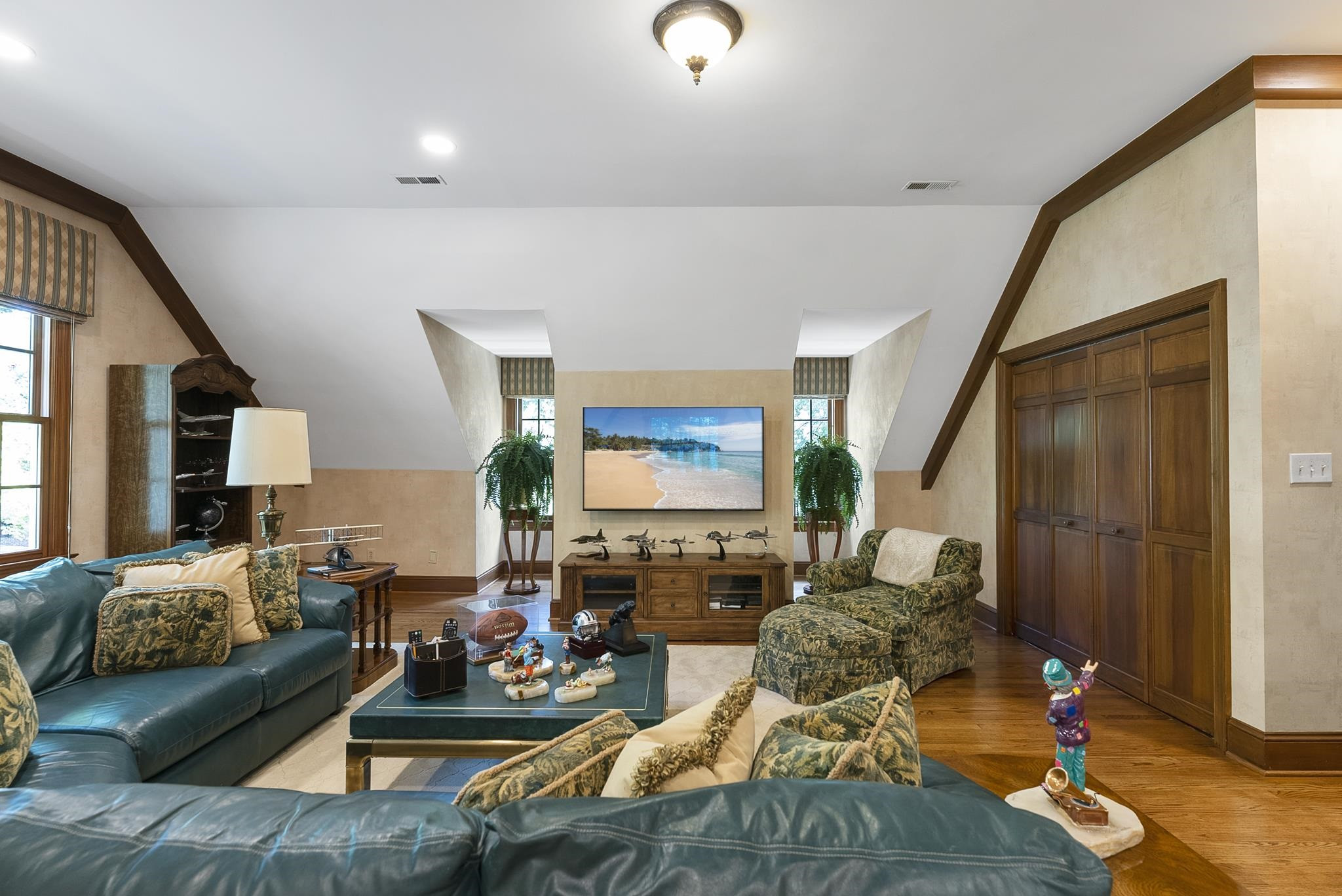 204 Carpathian Way Raleigh, NC 27615 - Photo 60 of 83 a living room with furniture and a flat screen tv