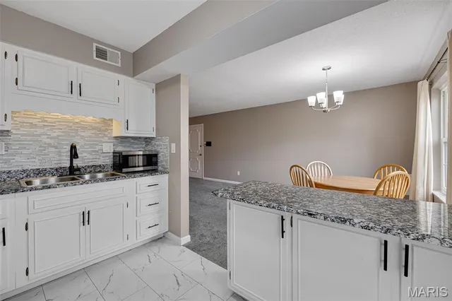 $115,000 | 1678 Blue Ridge Drive, Unit A, St. Louis, MO 63125