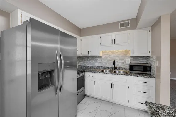 $112,500 | 1678 Blue Ridge Drive, Unit A, St. Louis, MO 63125