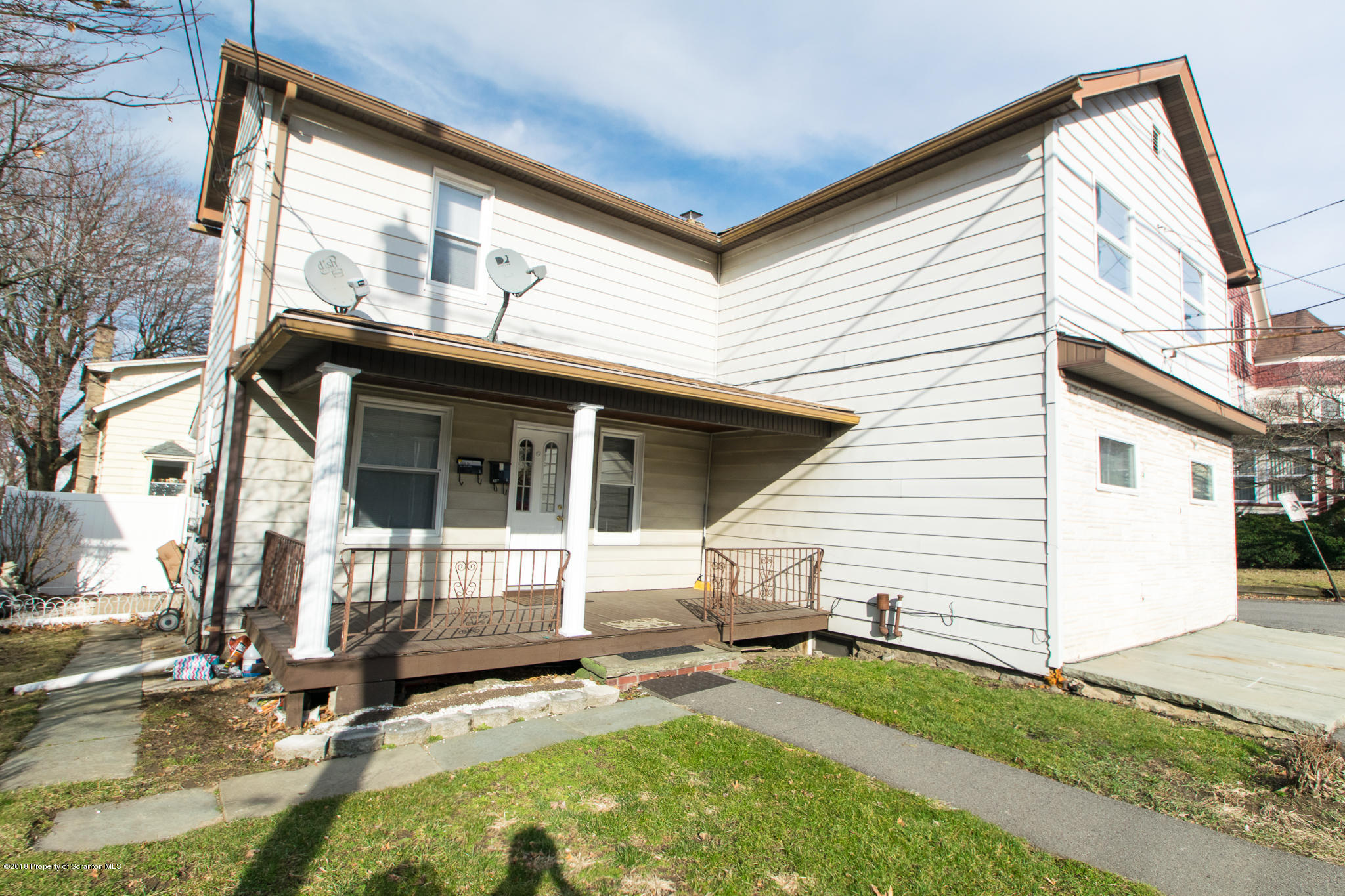 607 Spring Street Moosic, PA 18507 - Photo 1 of 24 a view of house with backyard