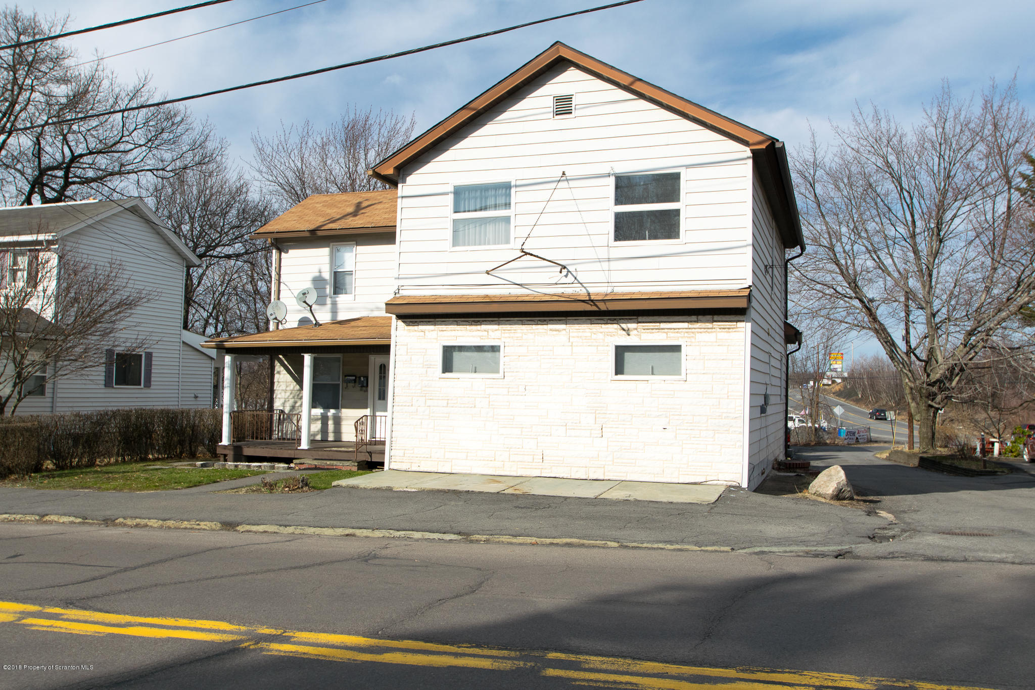 607 Spring Street Moosic, PA 18507 - Photo 3 of 24 a front view of a house