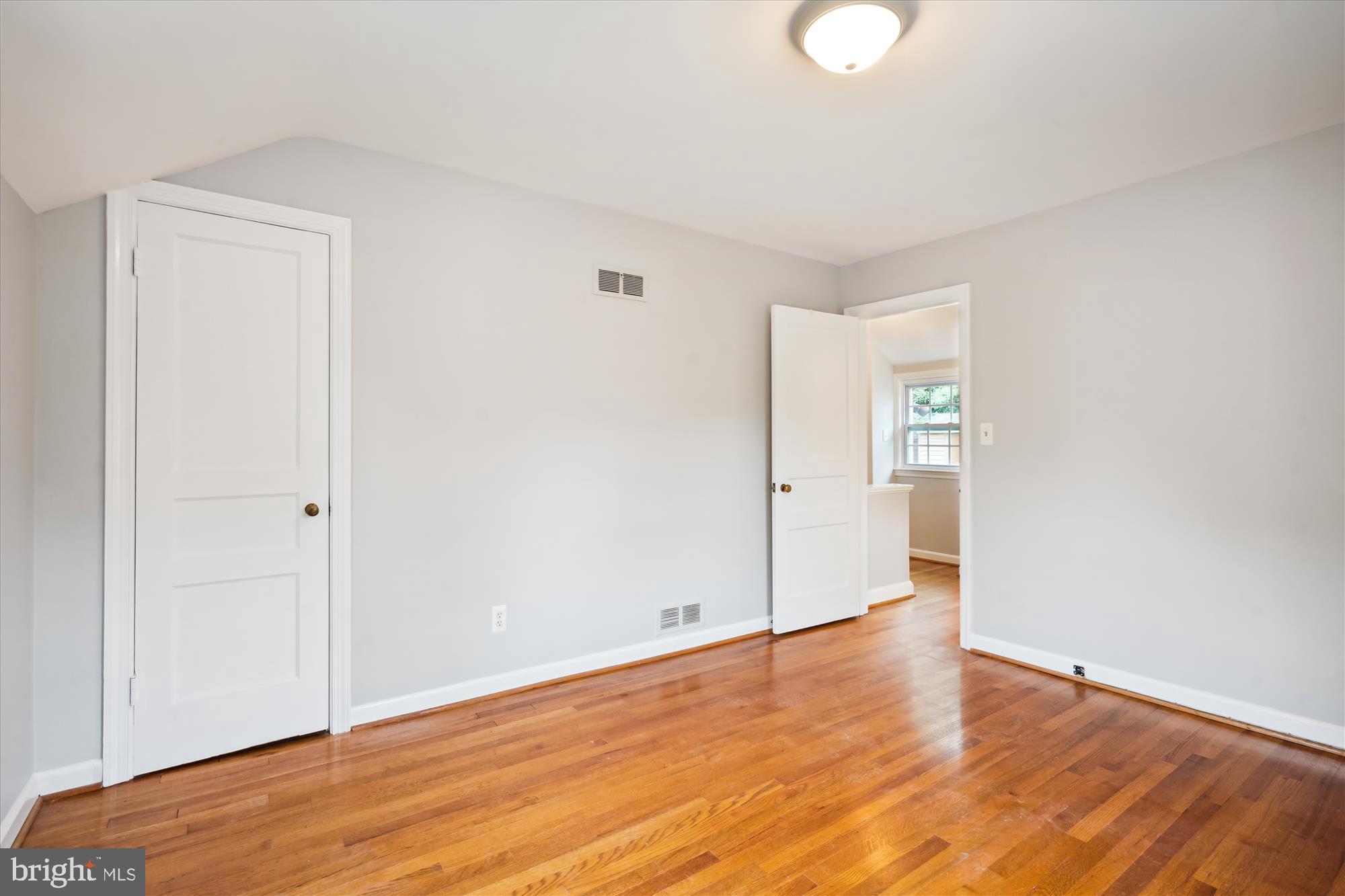 6124 12th Road North Arlington, VA 22205 - Photo 18 of 34 Primary Bedroom with hardwood floors.