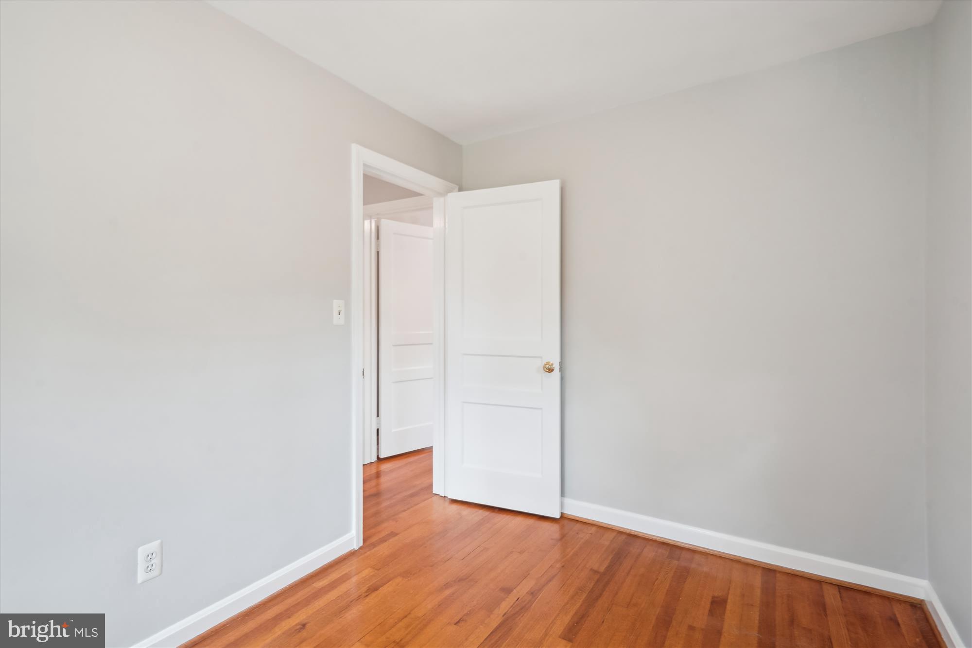 6124 12th Road North Arlington, VA 22205 - Photo 21 of 34 2nd bedroom with warm wood floors.