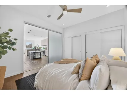 a bathroom with a sink a toilet a shower and a mirror