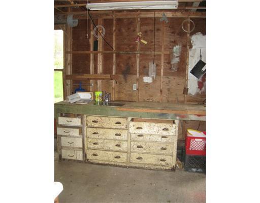 52 Long Cove Road St. George, ME 04860 - Photo 15 of 18 Parking Lot/Garage. workshop area in...