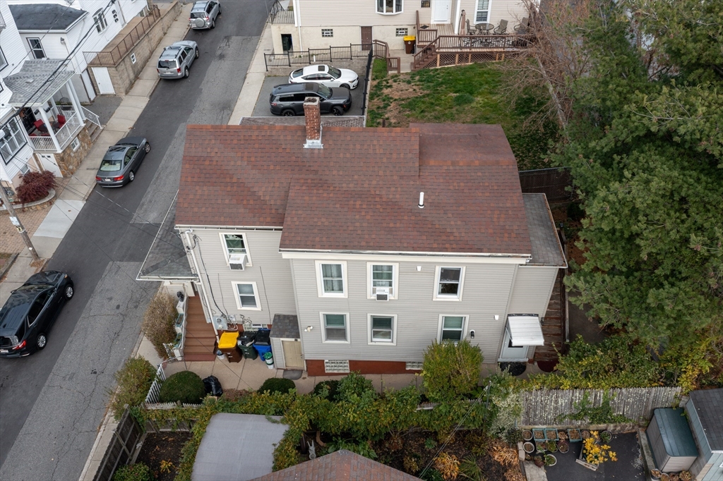 89 Oak Street Fall River, MA 02720 - Photo 31 of 39 an aerial view of multiple houses with yard