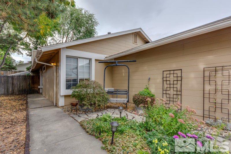 6006 White Water Way Reno, NV 89523 - Photo 1 of 20 front view of a house with potted plants