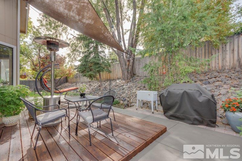 6006 White Water Way Reno, NV 89523 - Photo 18 of 20 a view of a table and chairs in patio