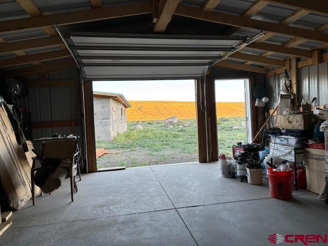 406 Canyon Road Antonito, CO 81120 - Photo 5 of 16 a view of gym equipment with a floor to ceiling window