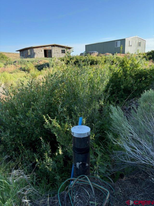 406 Canyon Road Antonito, CO 81120 - Photo 6 of 16 a view of a back yard from a balcony