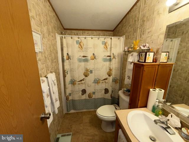 4938 Old Trappe Road Trappe, MD 21673 - Photo 10 of 10 a bathroom with a sink toilet and shower