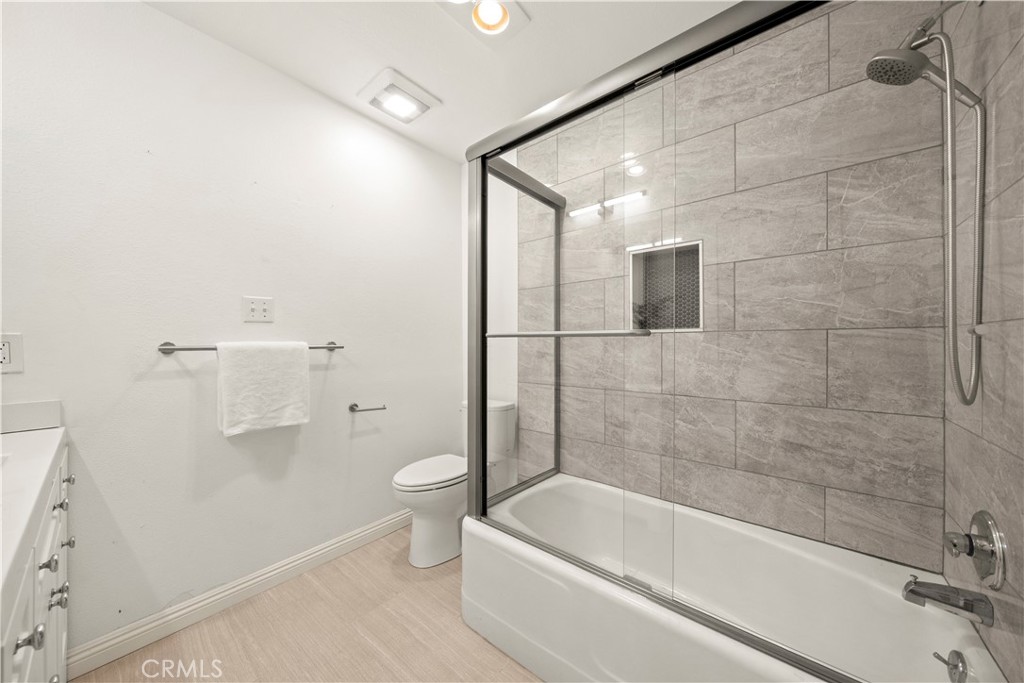 540 Fairview Avenue, Unit 27 Arcadia, CA 91007 - Photo 32 of 58 a bathroom with a granite countertop bathtub shower and toilet