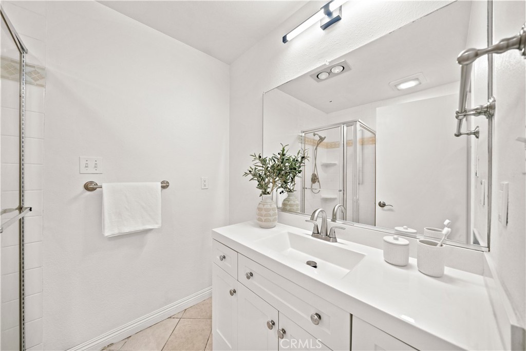 540 Fairview Avenue, Unit 27 Arcadia, CA 91007 - Photo 36 of 58 a bathroom with a sink a shower and a mirror