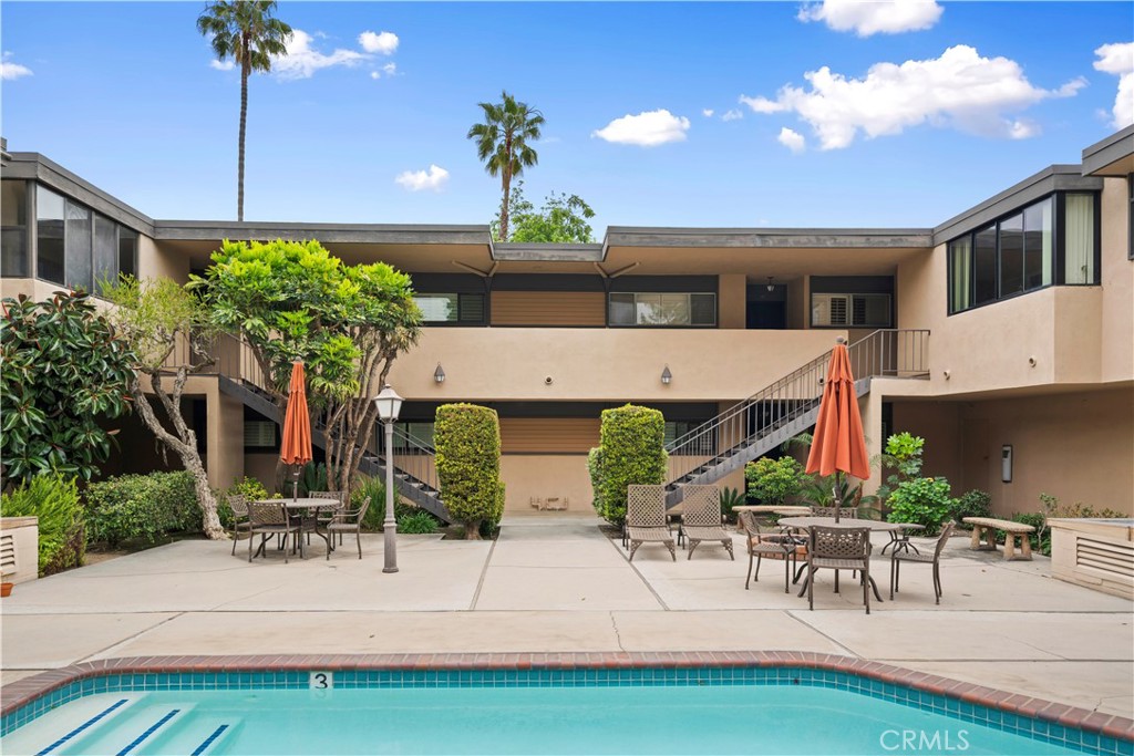 540 Fairview Avenue, Unit 27 Arcadia, CA 91007 - Photo 8 of 58 a view of a patio with table and chairs potted plants