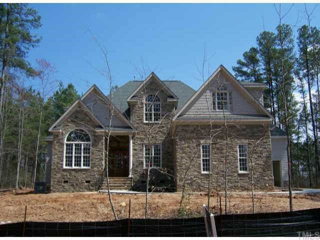 12236 The Gates Drive Raleigh, NC 27614 - Photo 1 of 3 front view of a house with a yard