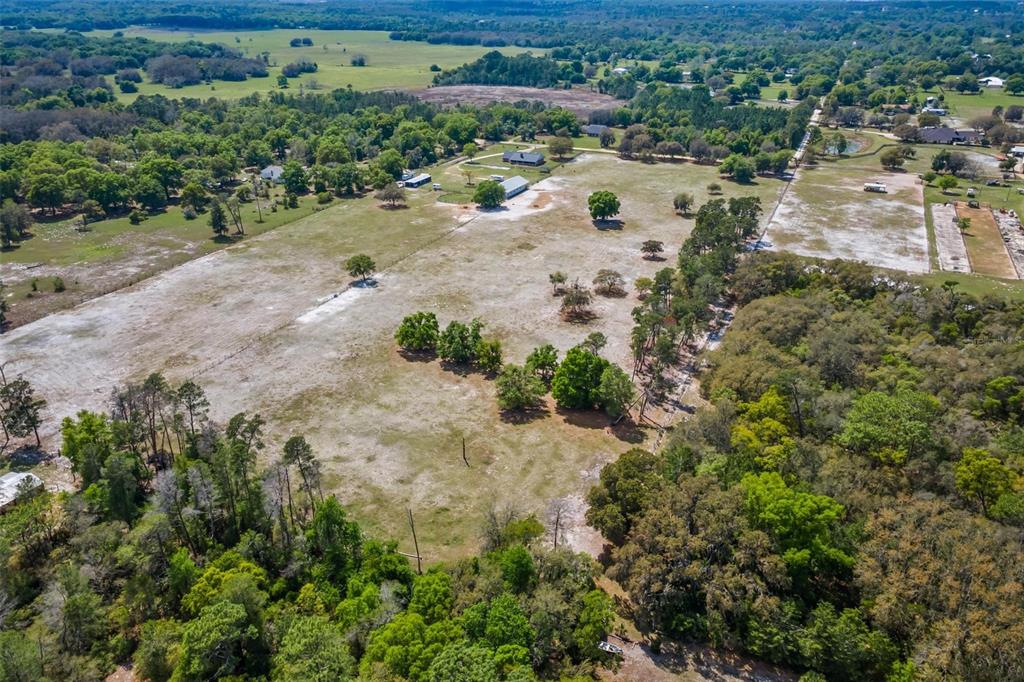 Winterwillow Lane Eustis, FL 32736 - Photo 19 of 28 an aerial view of a beach with a yard