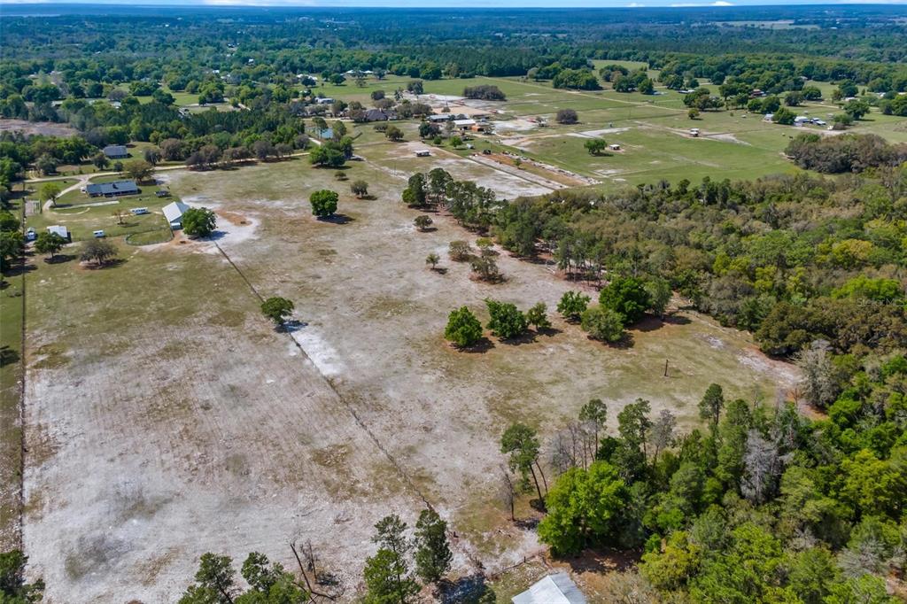 Winterwillow Lane Eustis, FL 32736 - Photo 27 of 28 an aerial view of a houses with a yard