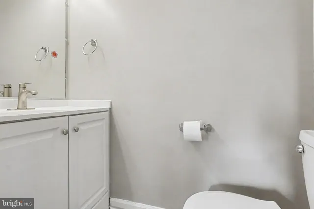 a bathroom with a sink a toilet and a bathtub