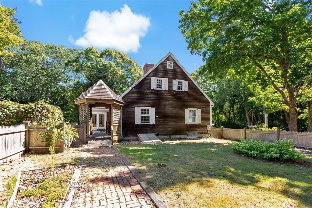 426 Old Post Road Barnstable, MA 02635 - Photo 18 of 27 a front view of a house with garden