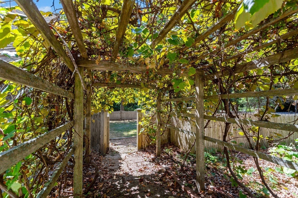 426 Old Post Road Barnstable, MA 02635 - Photo 26 of 27 a backyard of a house with lots of green space