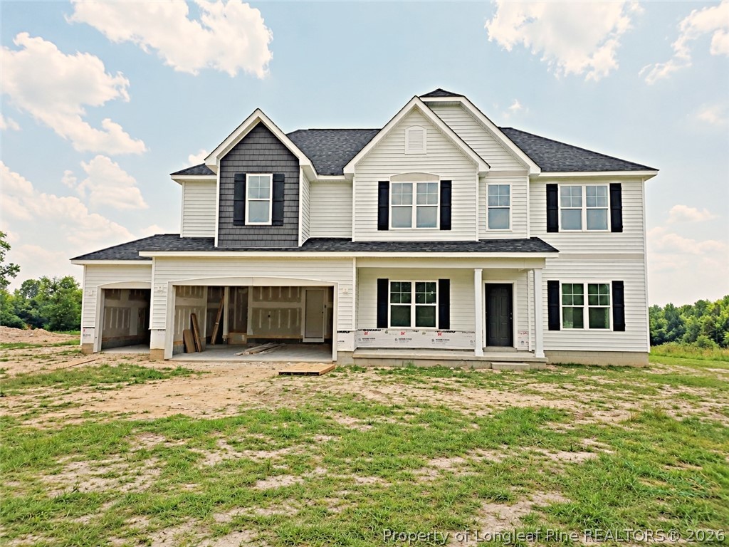 2650 Norrington Road Lillington, NC 27546 - Photo 19 of 24 a front view of a house with a yard
