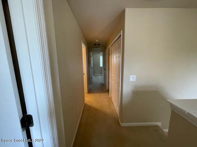 1420 Lara Circle, Unit 105 Rockledge, FL 32955 - Photo 11 of 20 a view of a hallway