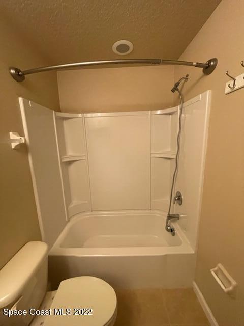 1420 Lara Circle, Unit 105 Rockledge, FL 32955 - Photo 16 of 20 a bathroom with a bathtub and a shower