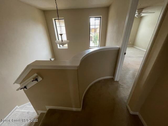 1420 Lara Circle, Unit 105 Rockledge, FL 32955 - Photo 18 of 20 a view of balcony with chair