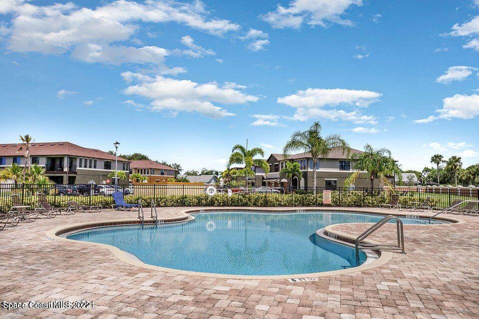 1420 Lara Circle, Unit 105 Rockledge, FL 32955 - Photo 20 of 20 a swimming pool view with a outdoor seating