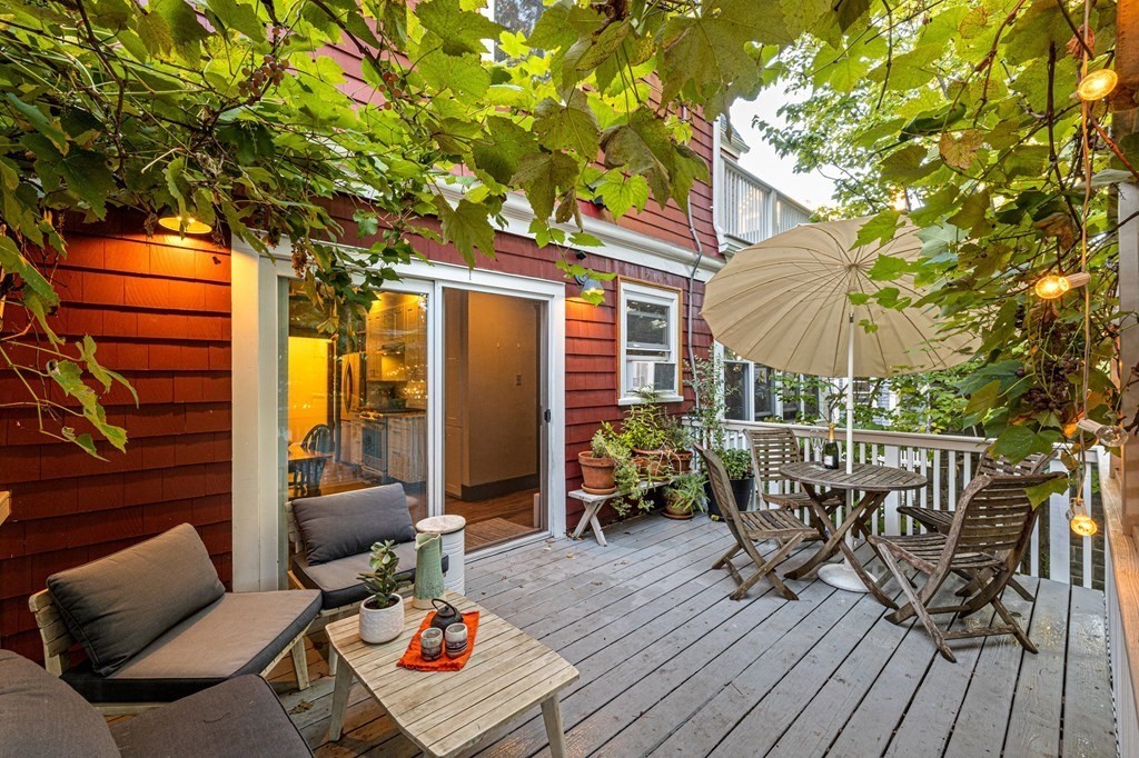 18 Alpha Road Boston, MA 02124 - Photo 14 of 42 a backyard of a house with seating space