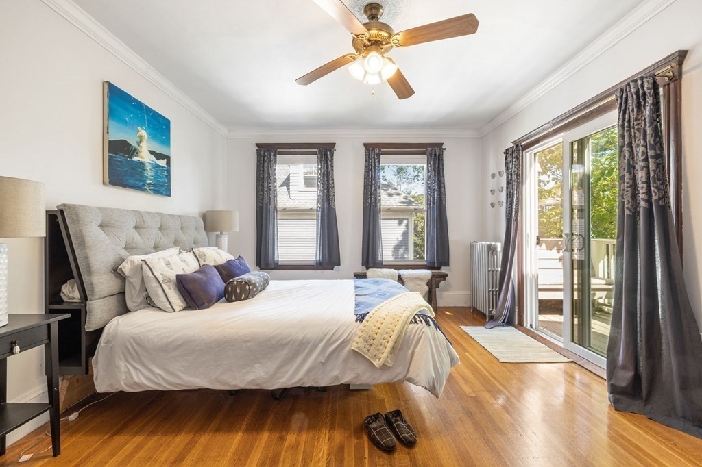 18 Alpha Road Boston, MA 02124 - Photo 23 of 42 a bedroom with a bed and a window